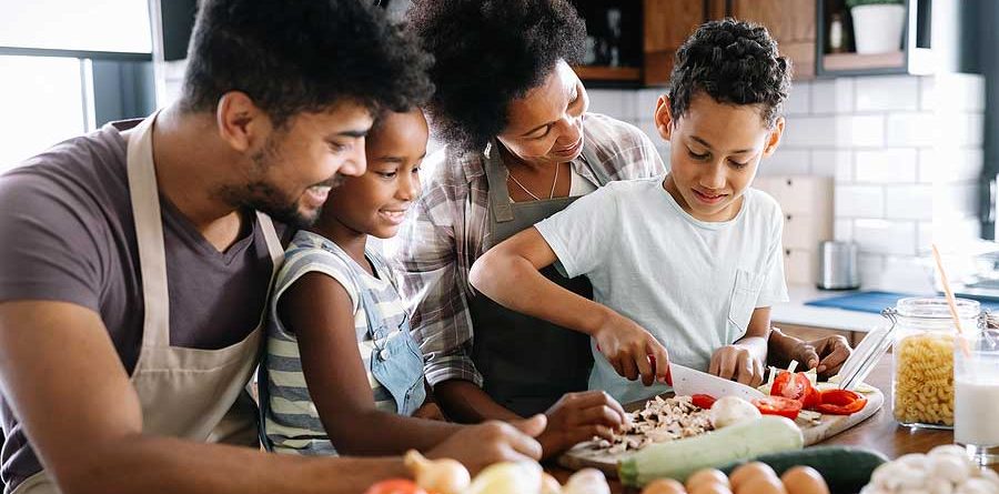 Happy family eating healthy food.