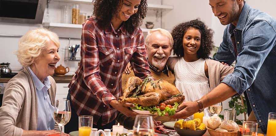 Family Eating Thanksgiving Dinner